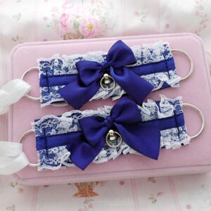 Alternative fashion navy wrist cuffs with lace and ribbon bow