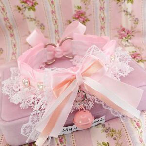 Baby pink kitten play collar with a white lace bow and a pearl heart charm